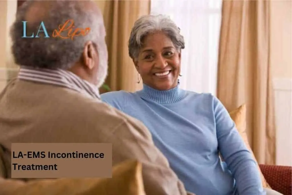 Couple sat smiling at each other - LA-EMS treatment Greater London (Camden)