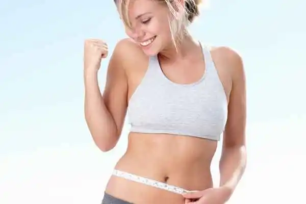 woman happy after fat reduction treatment Greater London (Camden)