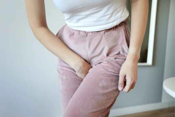 older woman running to the toilet because of urinary incontinence Greater London (Camden)