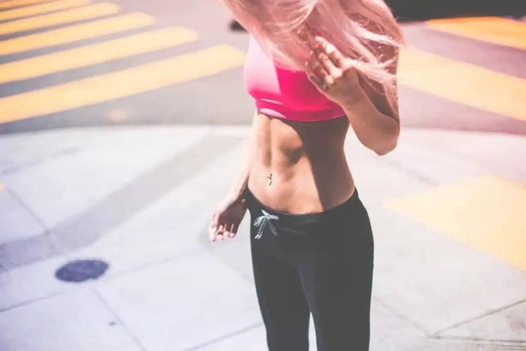 Woman with toned stomach after LA-EMS Body Sculpting Treatment Greater London (Camden)